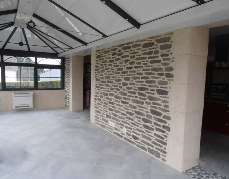MUR INTERIEUR DE VERANDA EN ENDUIT DECOPIERRE